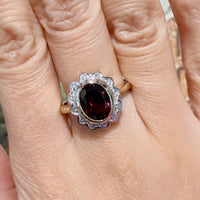 Garnets and diamond ring in 14 carat gold