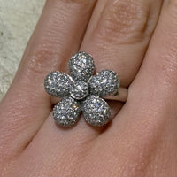 White gold flower ring with diamonds