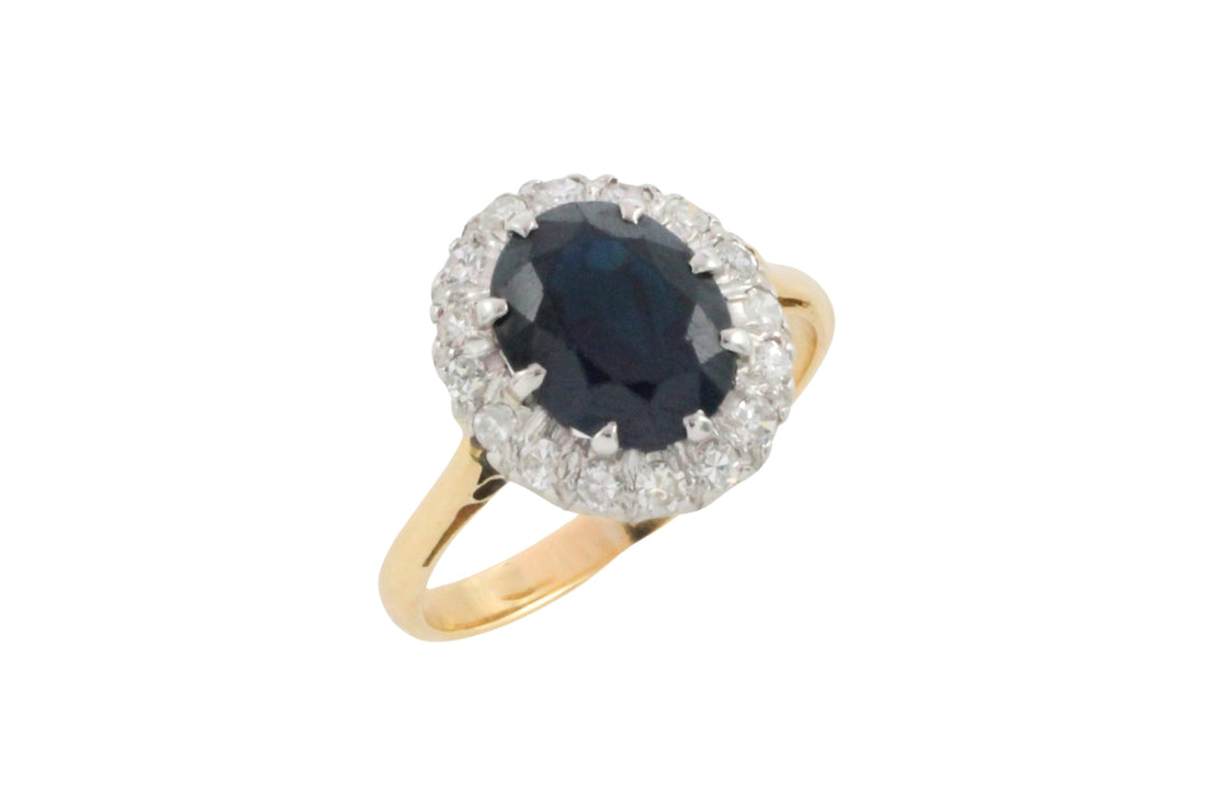 Vintage sapphire and diamond cluster ring