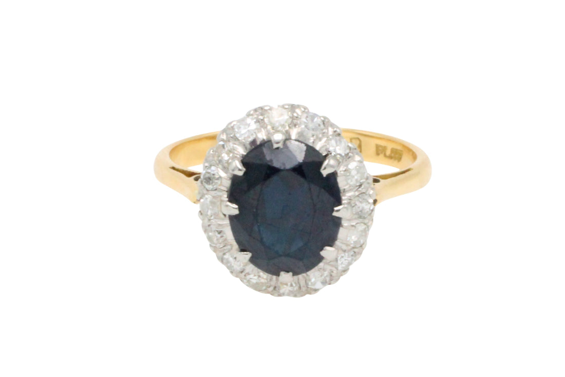 Vintage sapphire and diamond cluster ring