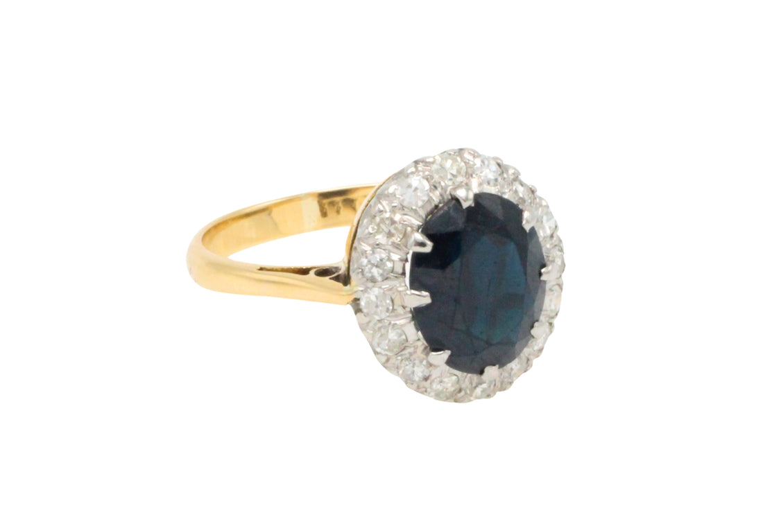 Vintage sapphire and diamond cluster ring