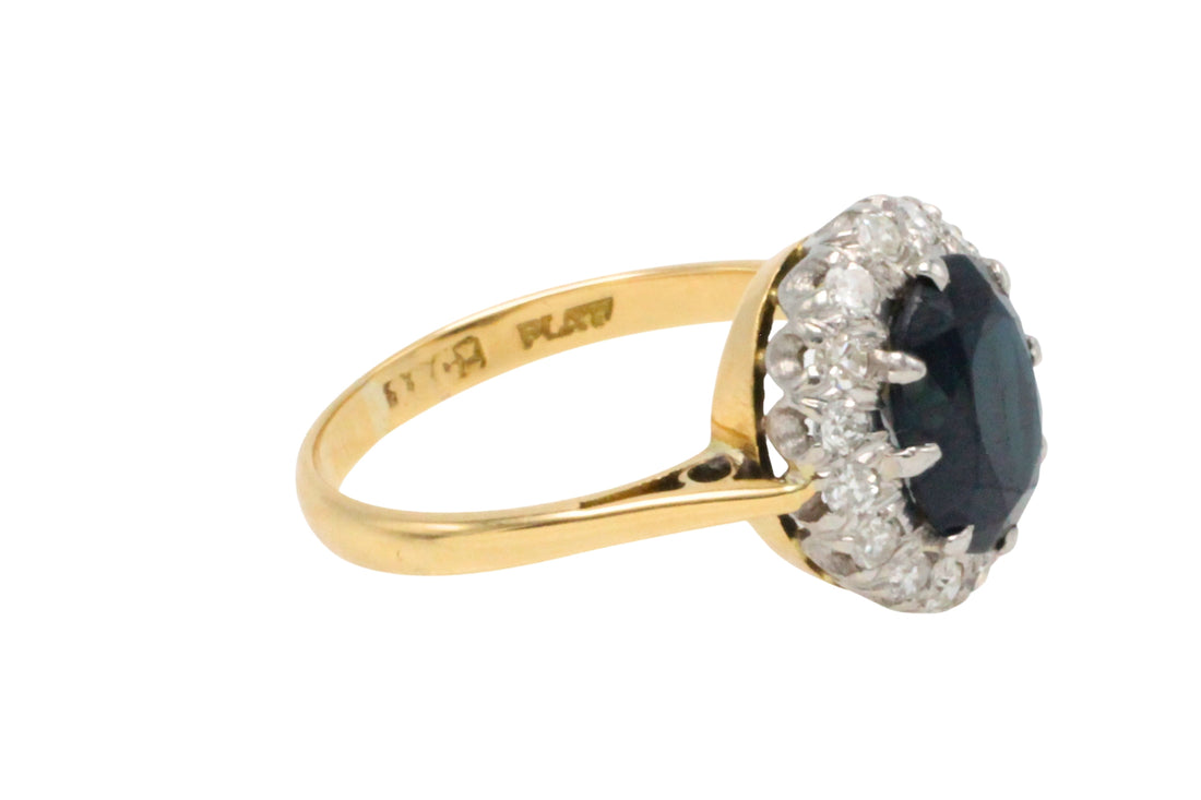 Vintage sapphire and diamond cluster ring