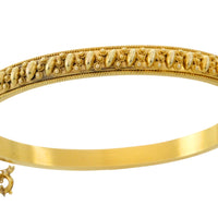 Vintage hinged bracelet in 14 carat gold