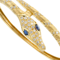 18 carat snake bracelet with diamonds and sapphires