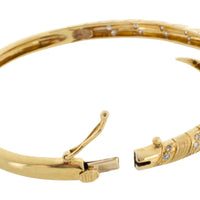 18 carat snake bracelet with diamonds and sapphires