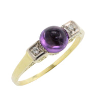 Cabochon amethyst ring with diamonds