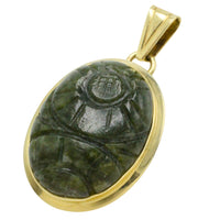 Neferite jade pendant in 14 carat gold