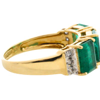 Emerald and diamond ring in 18 carat gold