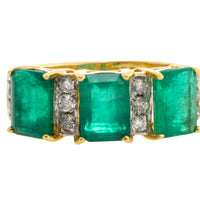 Emerald and diamond ring in 18 carat gold