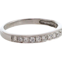 18 carat white gold band with diamonds