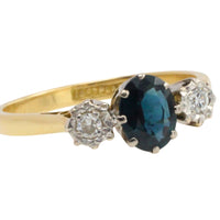 Vintage three stone sapphire and diamond ring