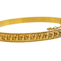 Vintage hinged bracelet in 14 carat gold