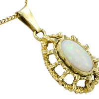 Cabochon opal pendant in 14 carat gold