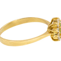 Emerald and diamond cluster ring in 18 carat gold