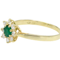 Emerald and diamond cluster ring
