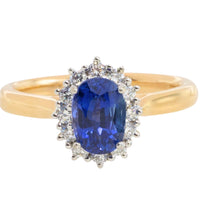 Saffier en diamanten cluster ring van 18 karaat goud