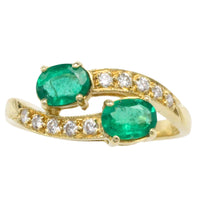 Vintage smaragd en diamanten kruiszetting ring