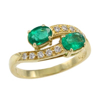 Vintage smaragd en diamanten kruiszetting ring