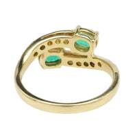 Vintage smaragd en diamanten kruiszetting ring