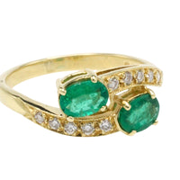 Vintage smaragd en diamanten kruiszetting ring