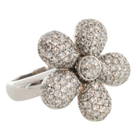 White gold flower ring with diamonds