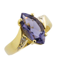 Iolite and diamond ring in 14 carat gold