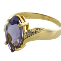 Iolite and diamond ring in 14 carat gold