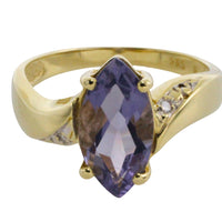 Iolite and diamond ring in 14 carat gold