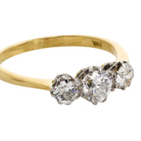 Three stone diamond ring in 18 carat gold