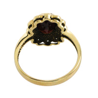 Garnets and diamond ring in 14 carat gold