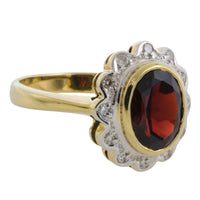 Garnets and diamond ring in 14 carat gold