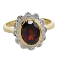 Garnets and diamond ring in 14 carat gold