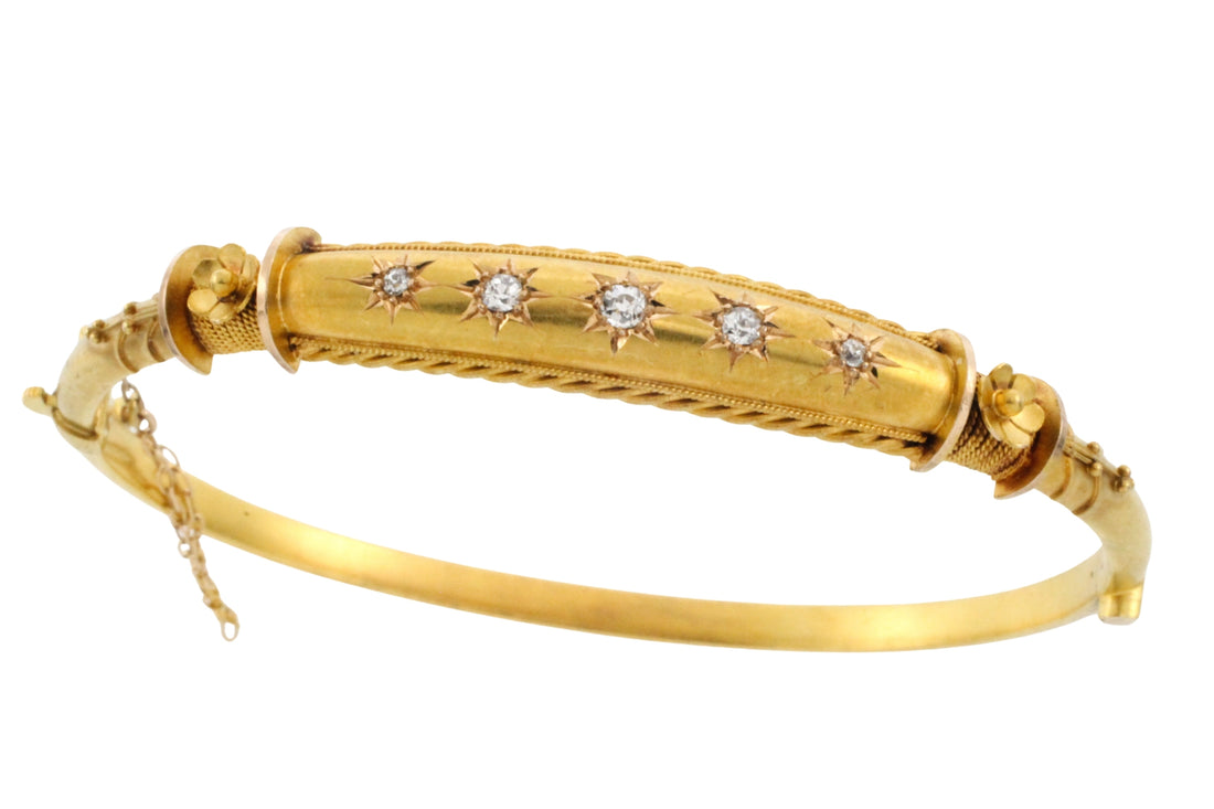 Edwardian hinged bracelet with old cut diamonds