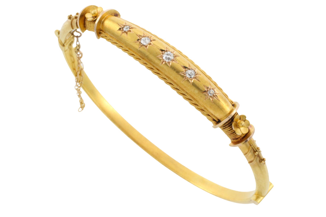 Edwardian hinged bracelet with old cut diamonds
