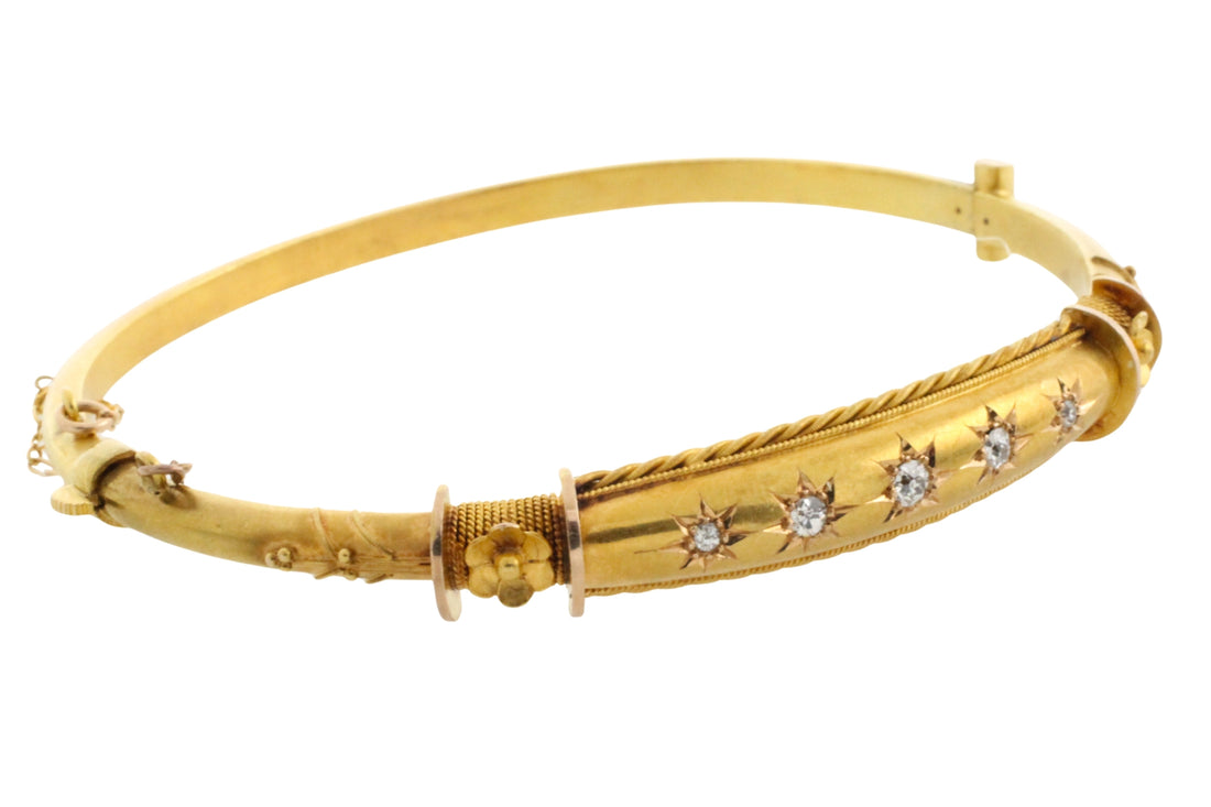 Edwardian hinged bracelet with old cut diamonds