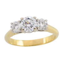 Three stone brilliant cut diamond ring