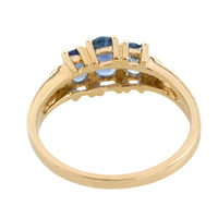 Three stone sapphire ring in 14 carat gold