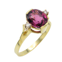 Vintage garnet and diamond ring in 14 carat gold