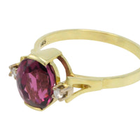 Vintage garnet and diamond ring in 14 carat gold