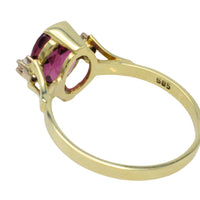Vintage garnet and diamond ring in 14 carat gold