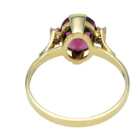 Vintage garnet and diamond ring in 14 carat gold