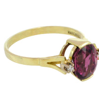 Vintage garnet and diamond ring in 14 carat gold