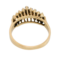 Emerld and diamond ring in 14 carat gold