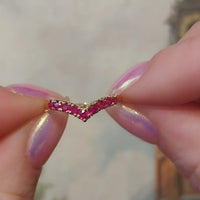 Ruby wish bone ring in 18 carat gold