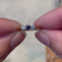 Three stone sapphire and diamond ring in 18 carat gold