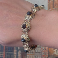 Vintage 14 carat gold link bracelet with garnets