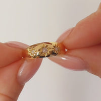 Edwardian three stone gypsy ring from 1908