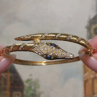18 carat snake bracelet with diamonds and sapphires