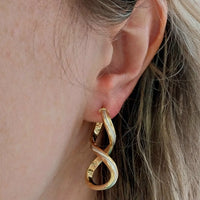 Spiral earrings in yellow and white gold