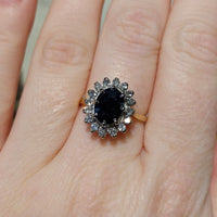 Vintage sapphire and diamond cluster ring